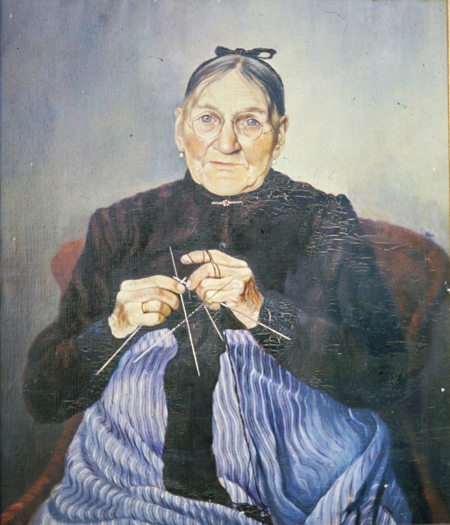 Mutter beim Stricken